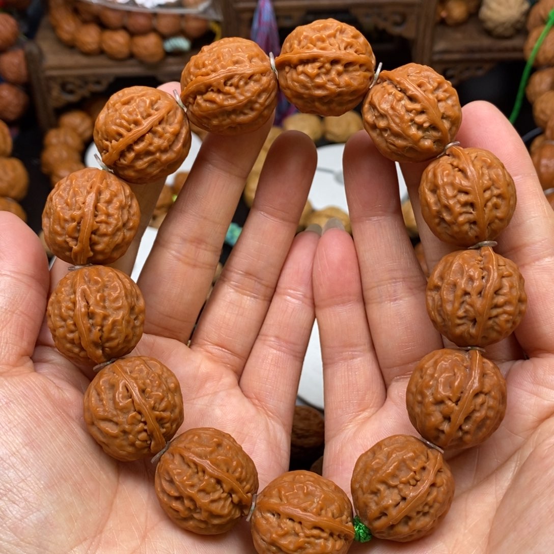 桃核手串麒麟鸽子蛋