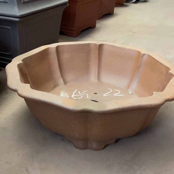 奋***…花盆紫砂只顾看手机的小