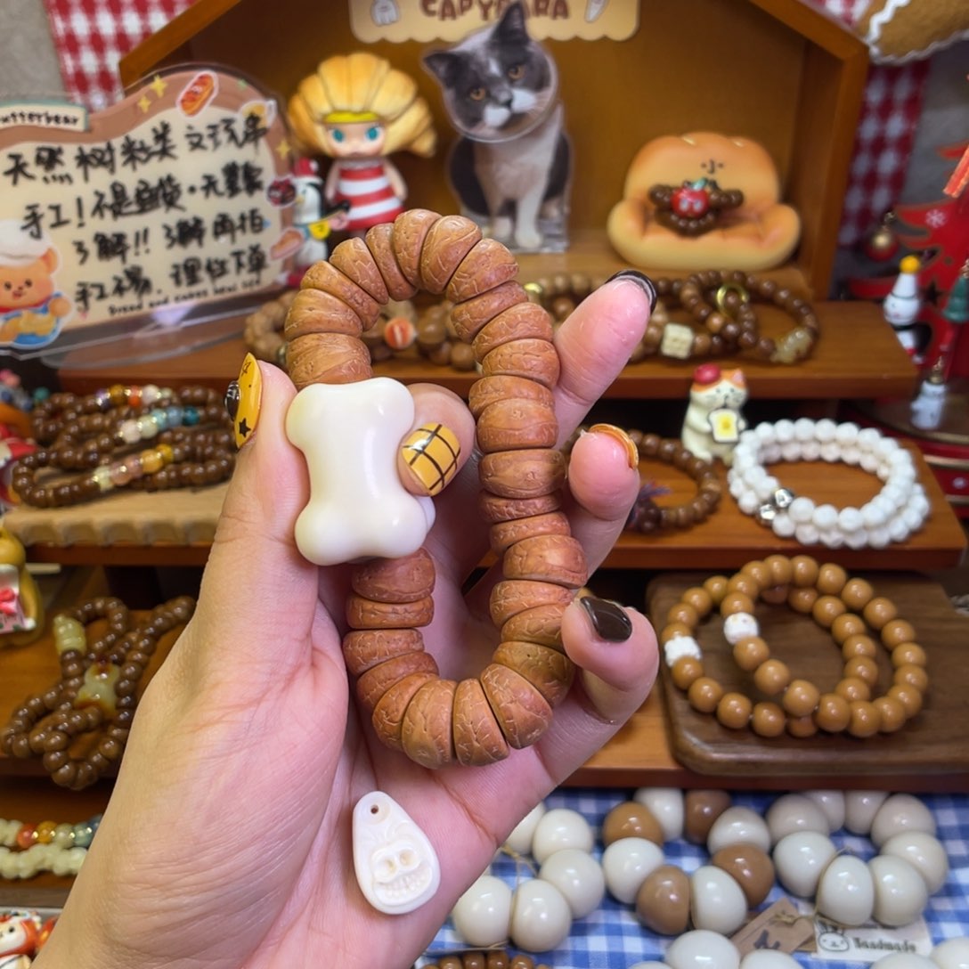 凤眼菩提把件骨头设计款带驼骨小牌