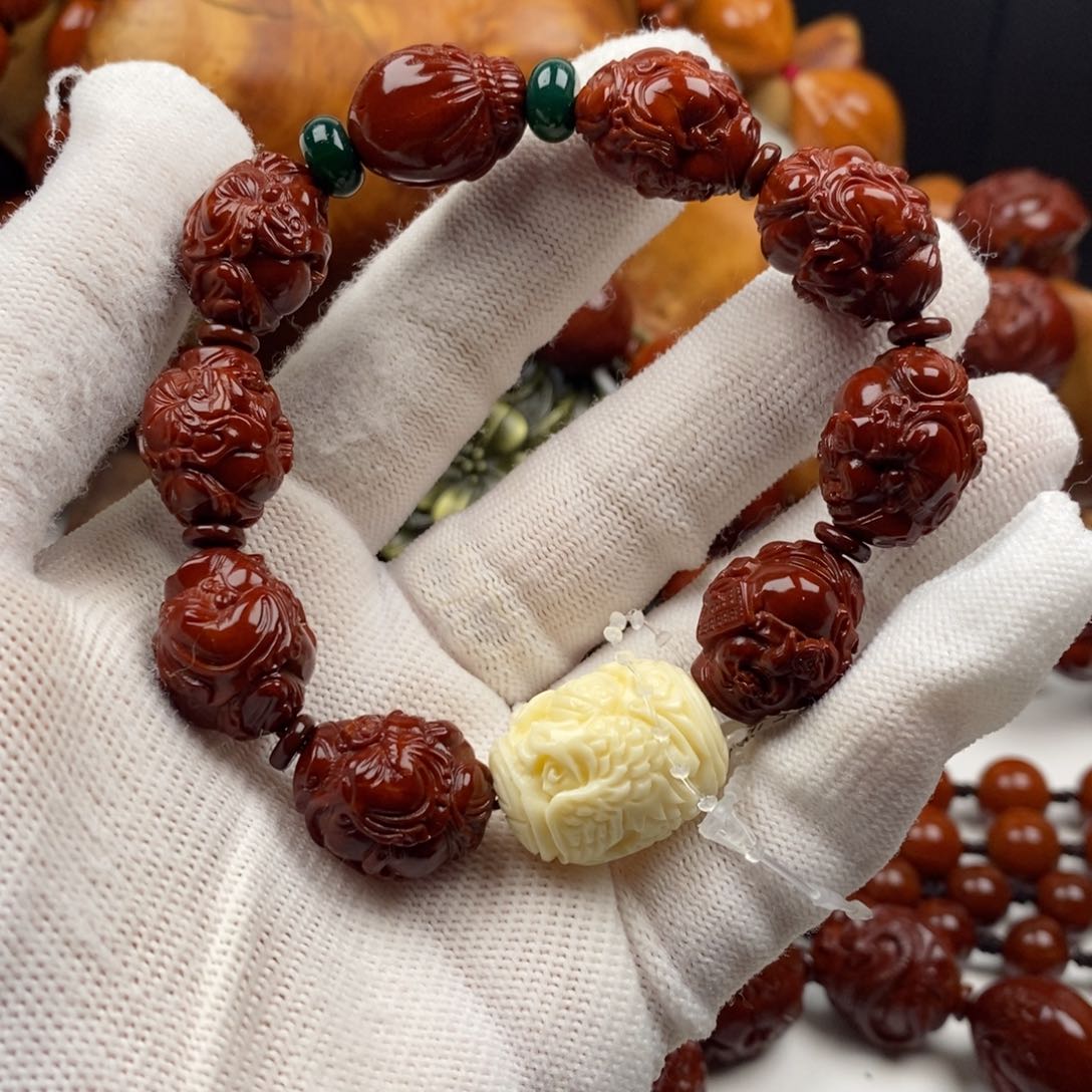 橄榄核手串M****男我想知道