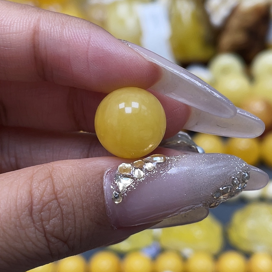 落***悔琥珀未镶嵌裸石12.6mm圆珠瑕