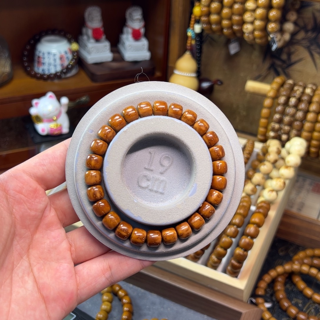 鱼****非金属紫金鼠9.3*8.2实心黄皮老型精品