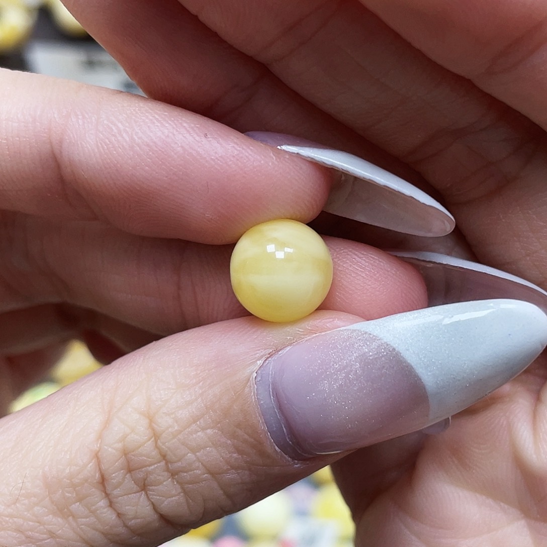 琥珀珠宝奇石未镶嵌李*10.3mm微瑕平头