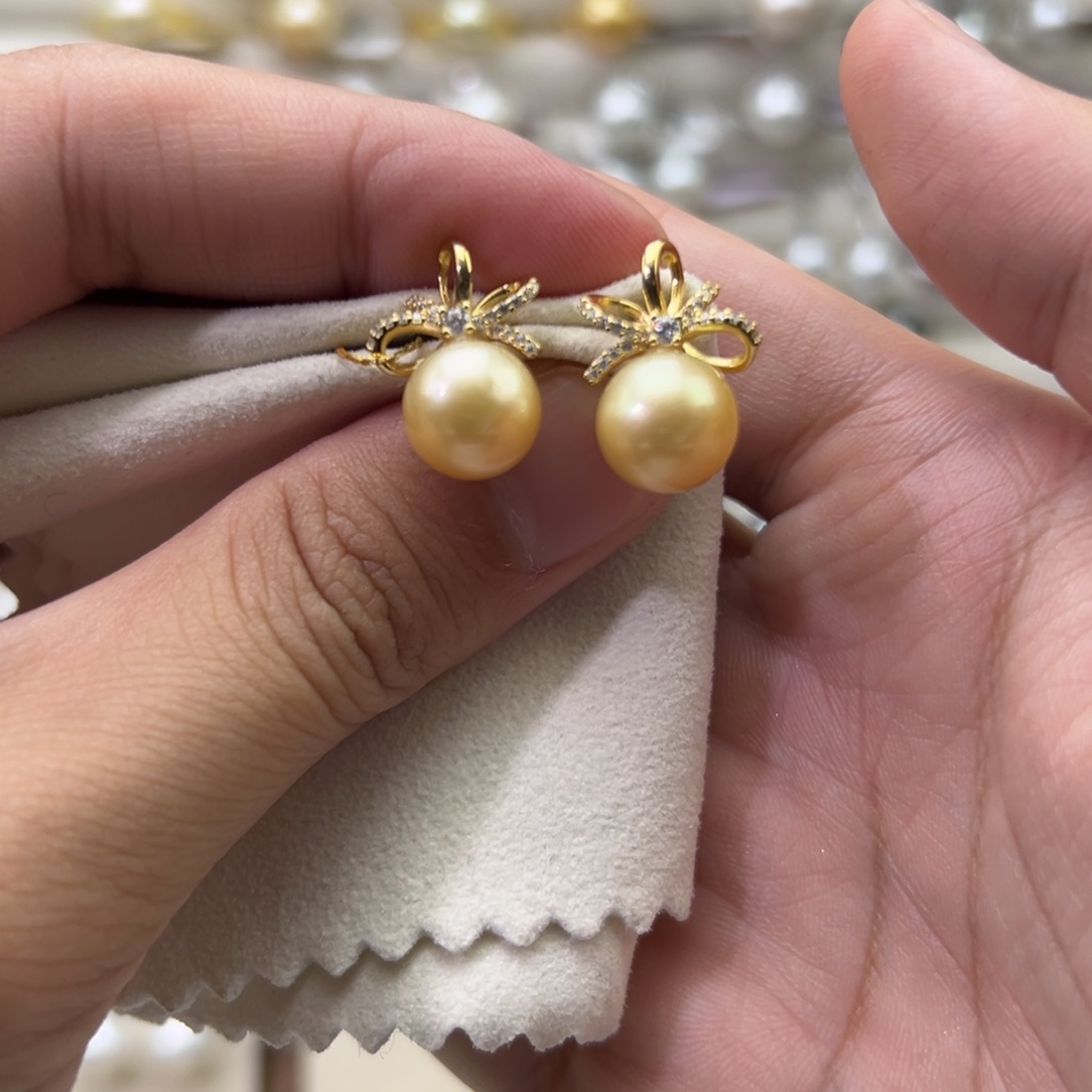 银S925镶嵌耳饰海水珍珠10mm金珠蝴蝶结耳钉