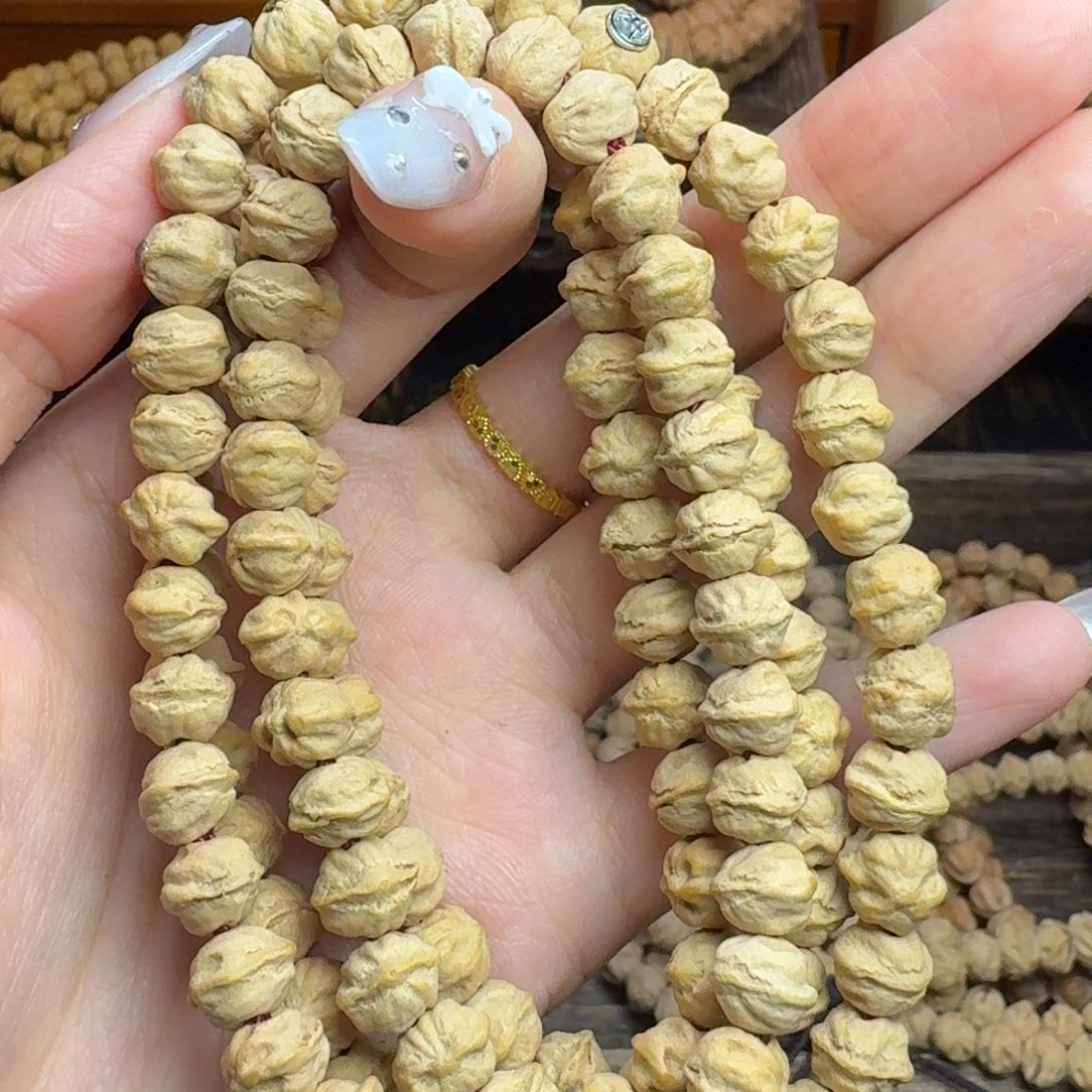 敏***5手串柏香籽/百香籽醒狮