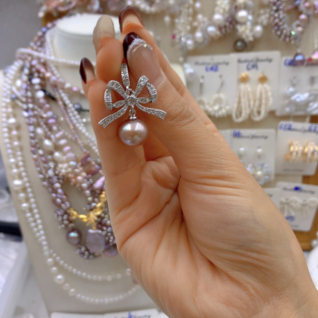 淡水珍珠耳饰银S925镶嵌哆***?