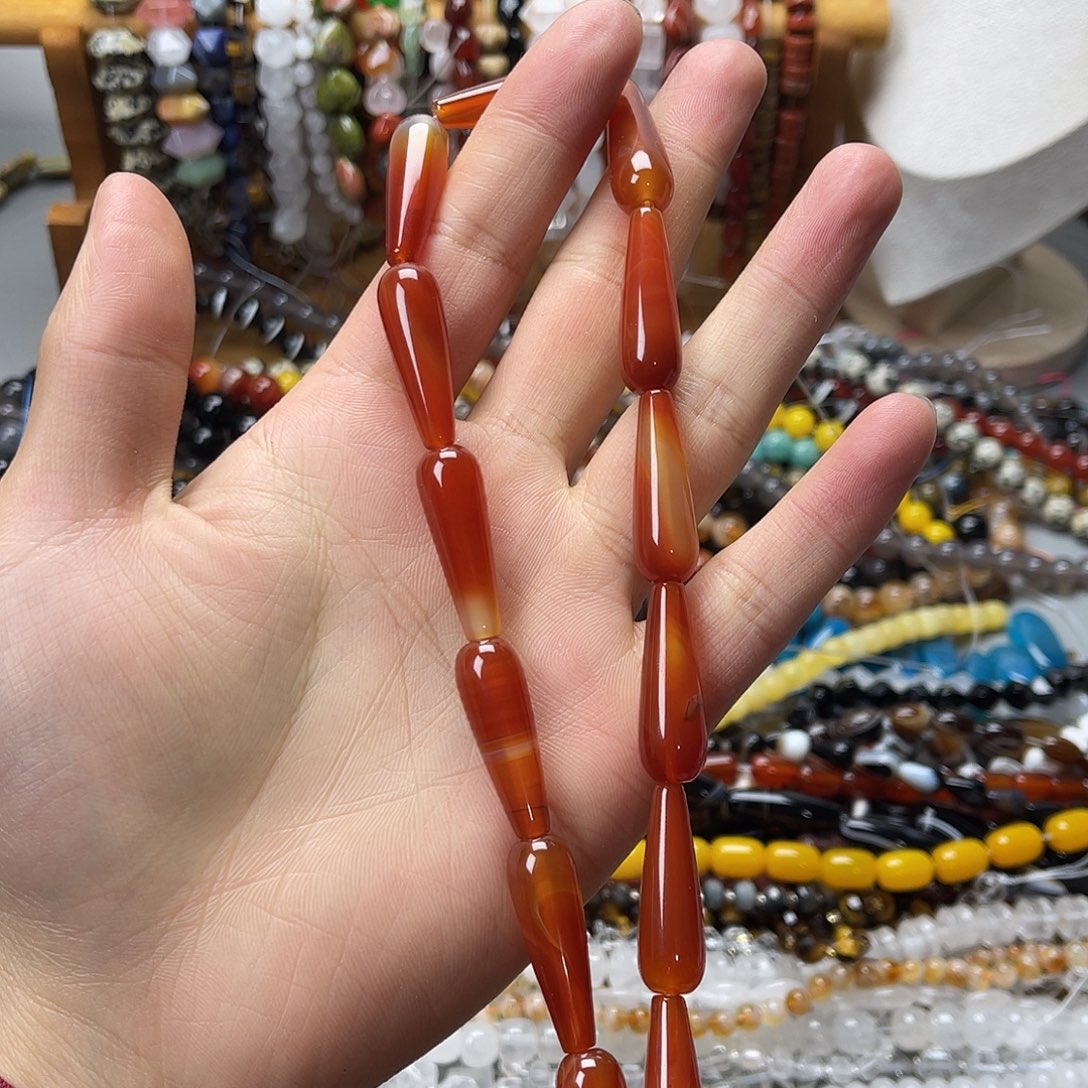 玛瑙/玉髓未镶嵌珠宝半成品10×30红玛水滴一条