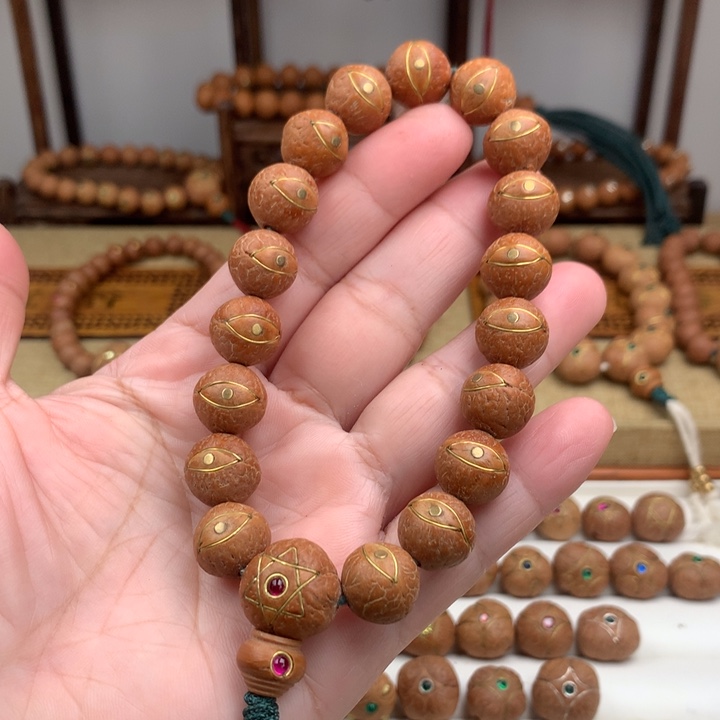 阿***军凤眼菩提吊坠手串