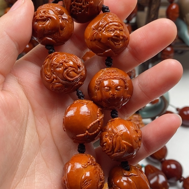 橄榄核吊坠赵*外回血回血