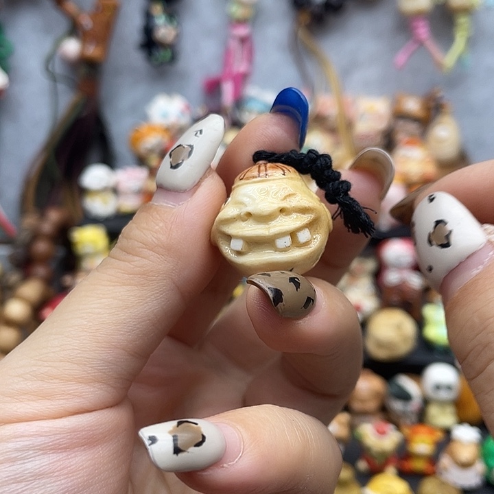 非金属根付娃娃一个