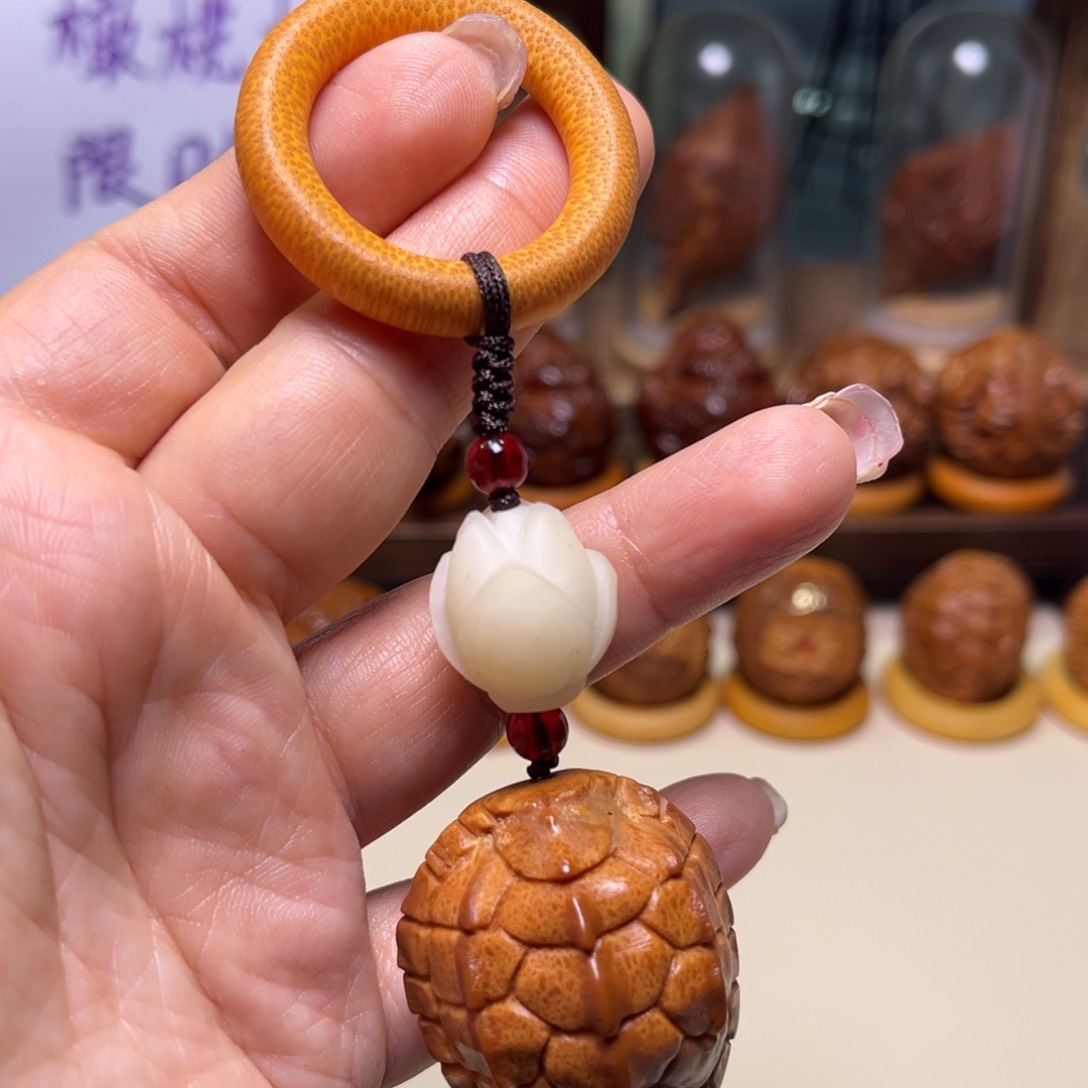 橄榄核把件捡漏富甲手把