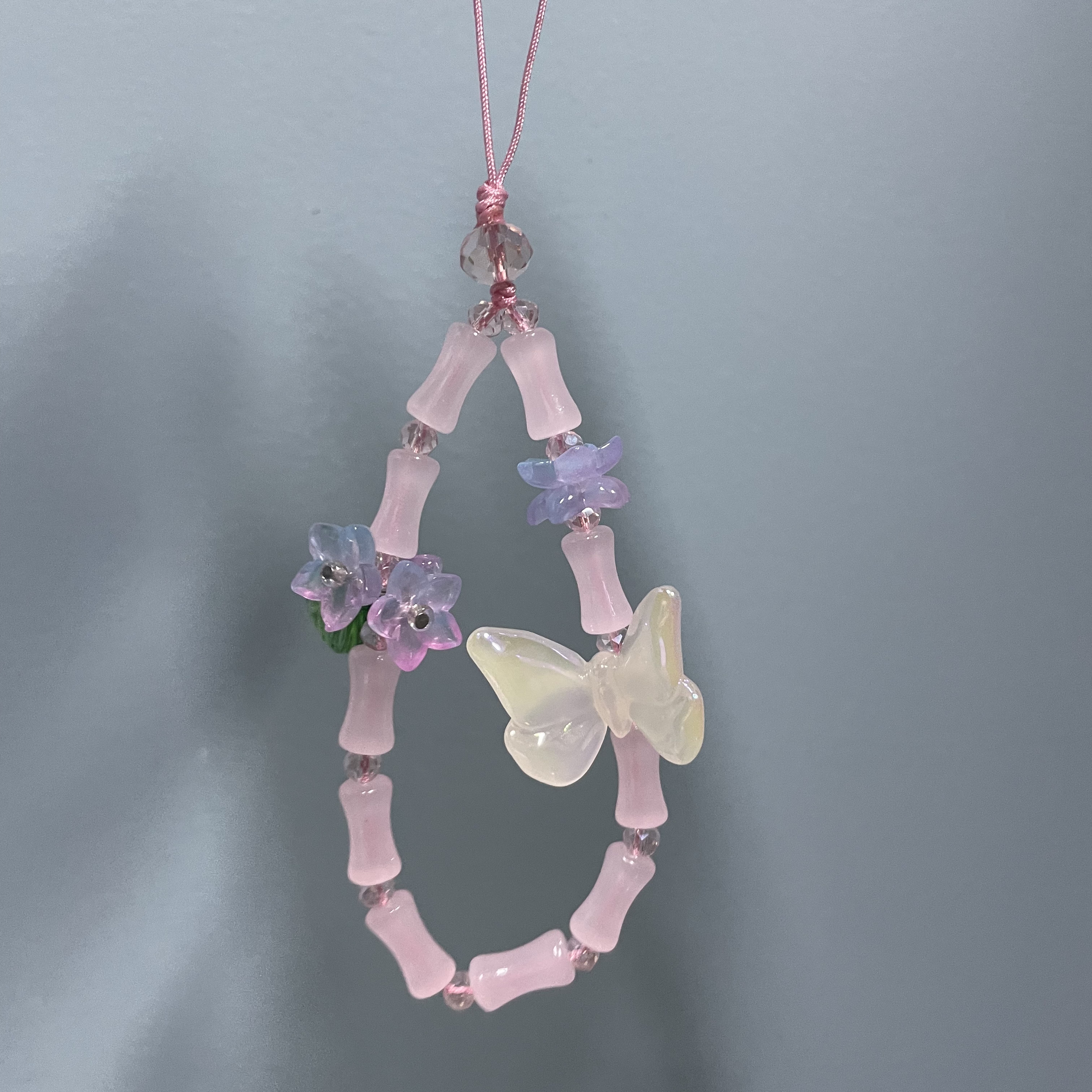 绳款粉色竹节蝴蝶款短款手机链E155