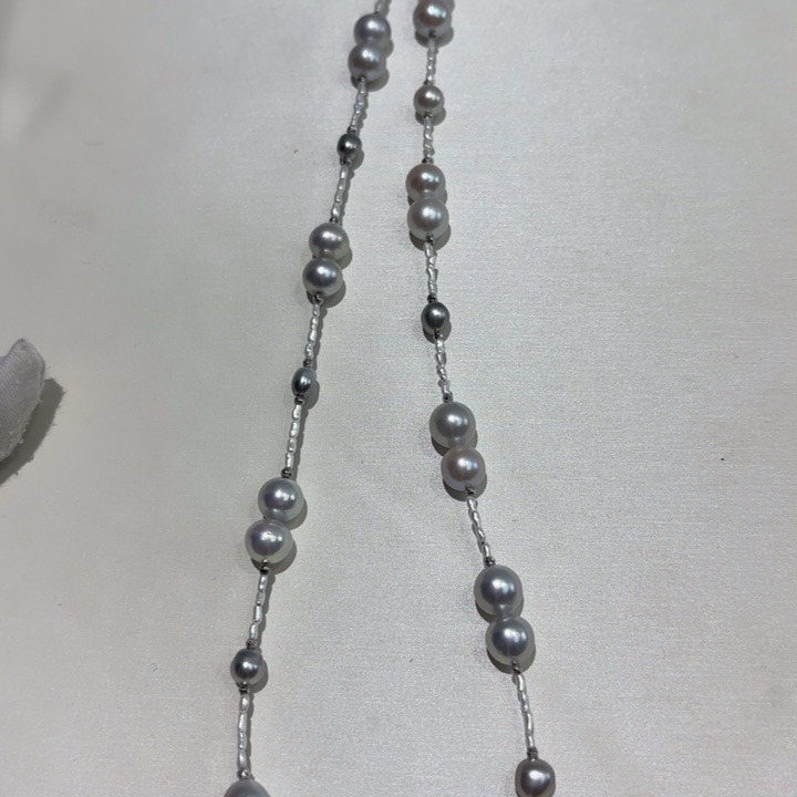 金***.颈饰18K金镶嵌海水珍珠