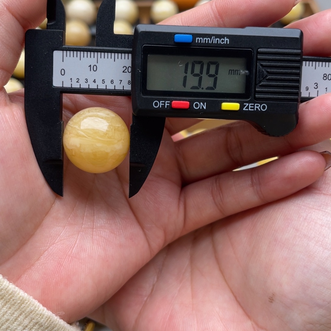 琥珀未镶嵌裸石蜜蜡圆珠笑