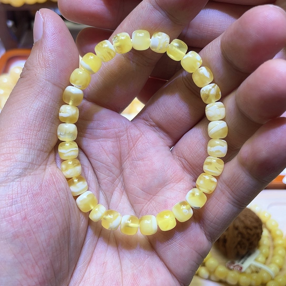 蜜蜡手串未镶嵌7mm金瓷白溶洞带点拉丝