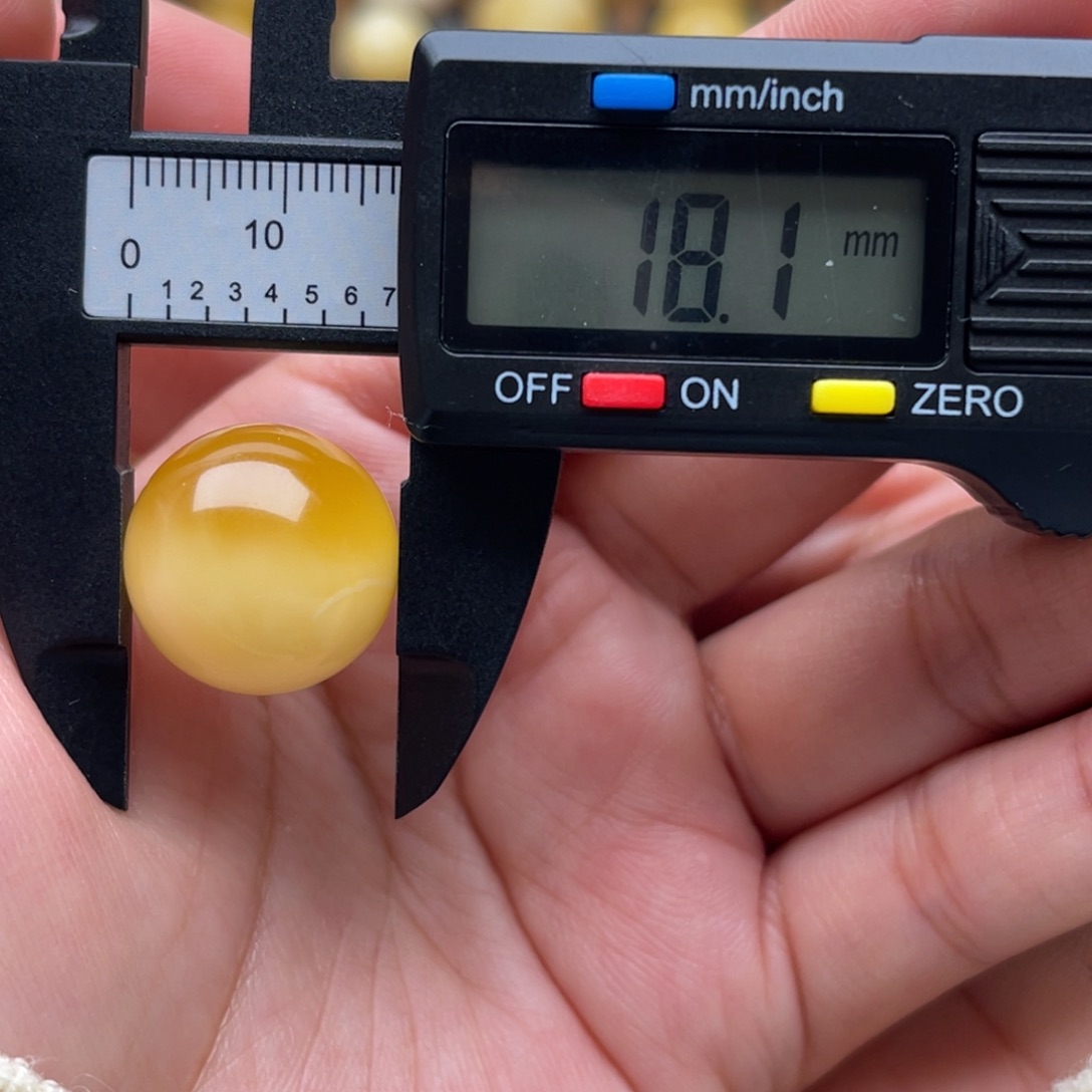 琥珀未镶嵌裸石蜜蜡圆珠笑