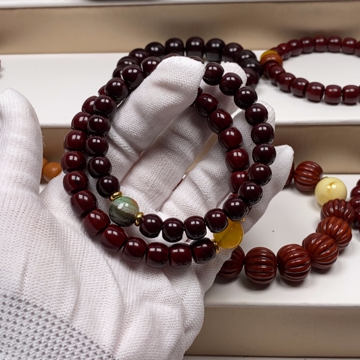 核桃手串/手链叫**妞猴头雕刻