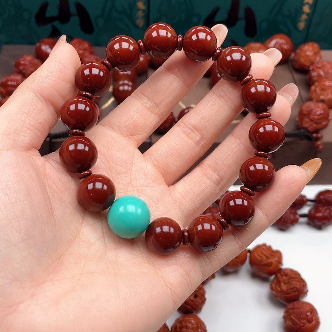 橄榄核手串万****生光珠手串