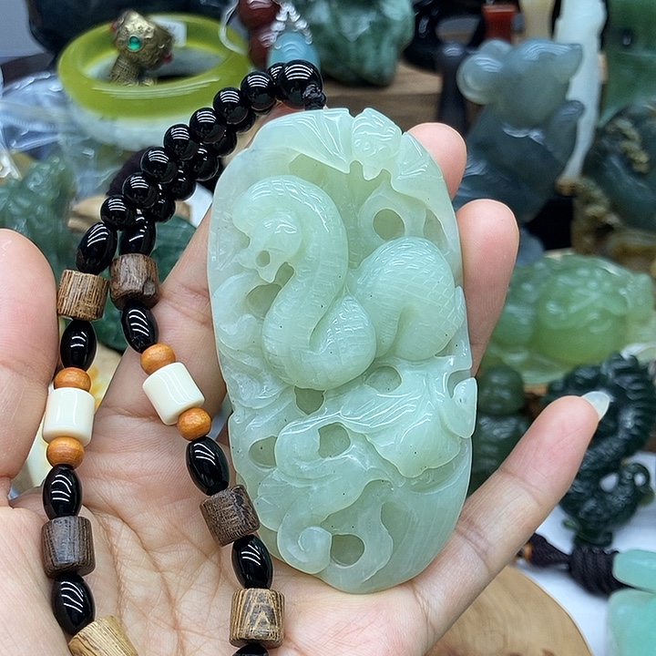 岫玉未镶嵌手把件