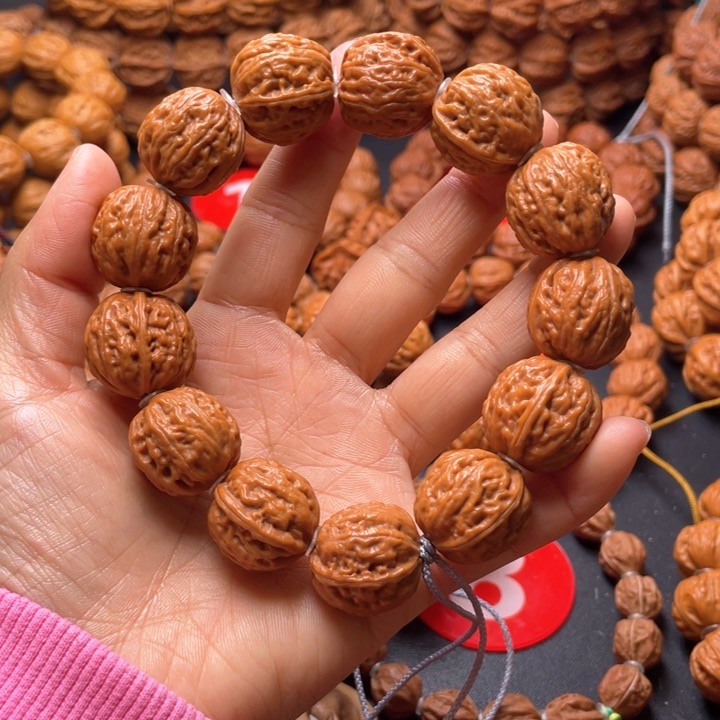 文玩核桃吊坠尚****业cu jin mai sui