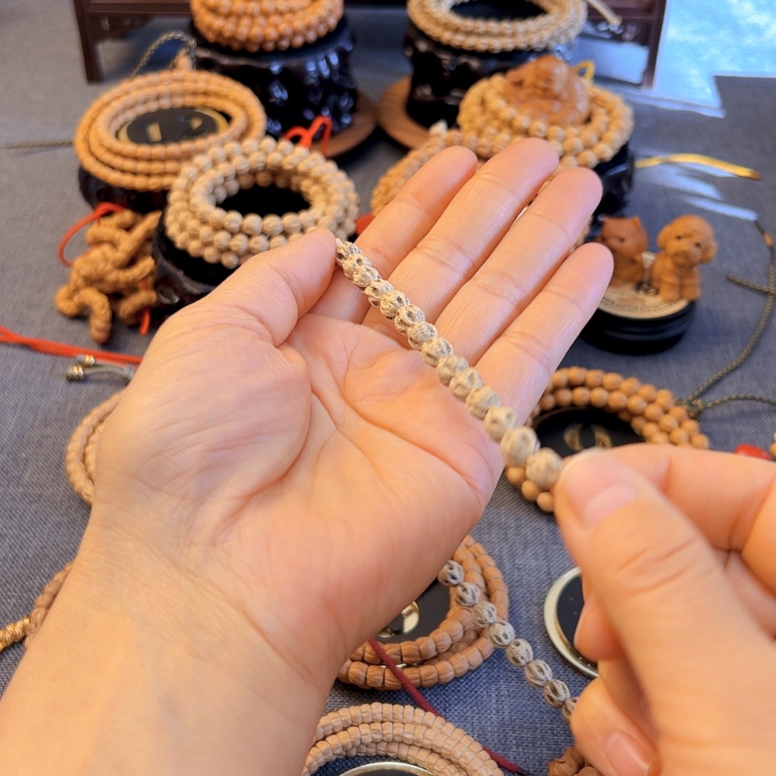 锅***官柏香籽/百香籽手串