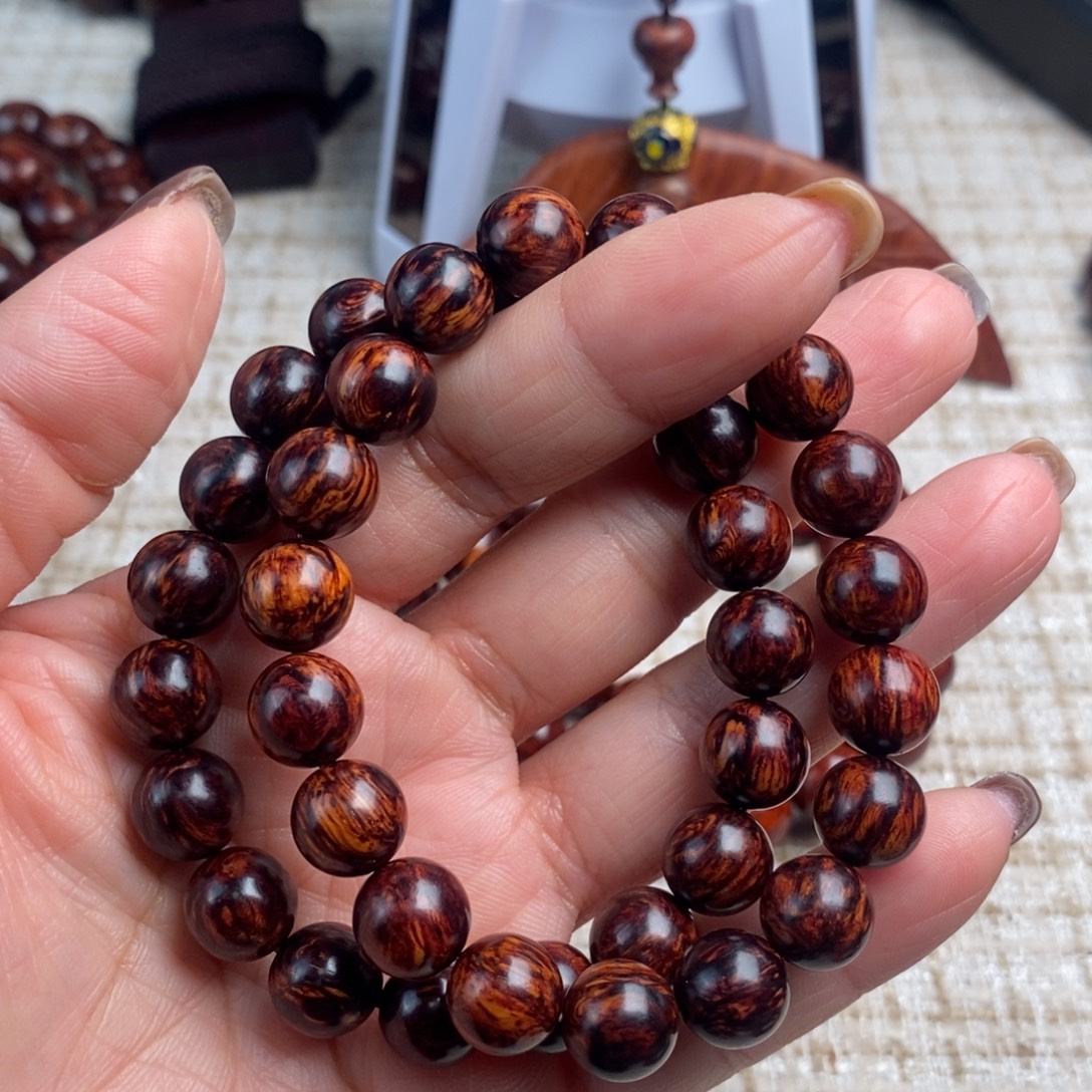 辰***时木质类1.0红降花梨公黑金火焰纹双圈