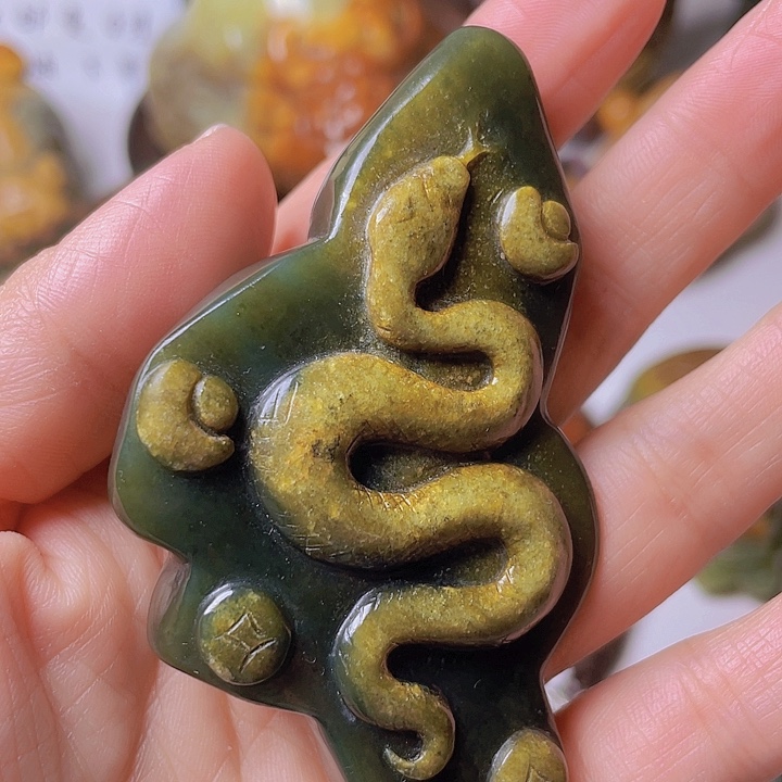 和田玉手把件未镶嵌