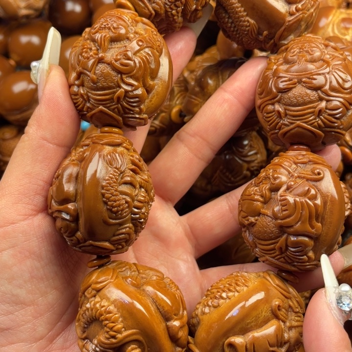 橄榄核吊坠北****）橄榄核