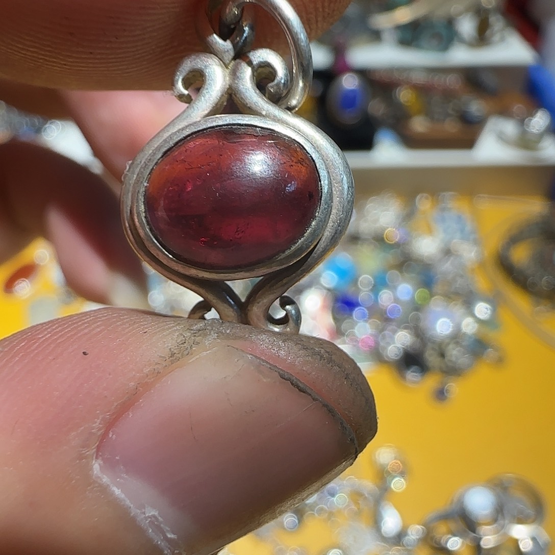 小***精大理石合金吊坠的设计也是