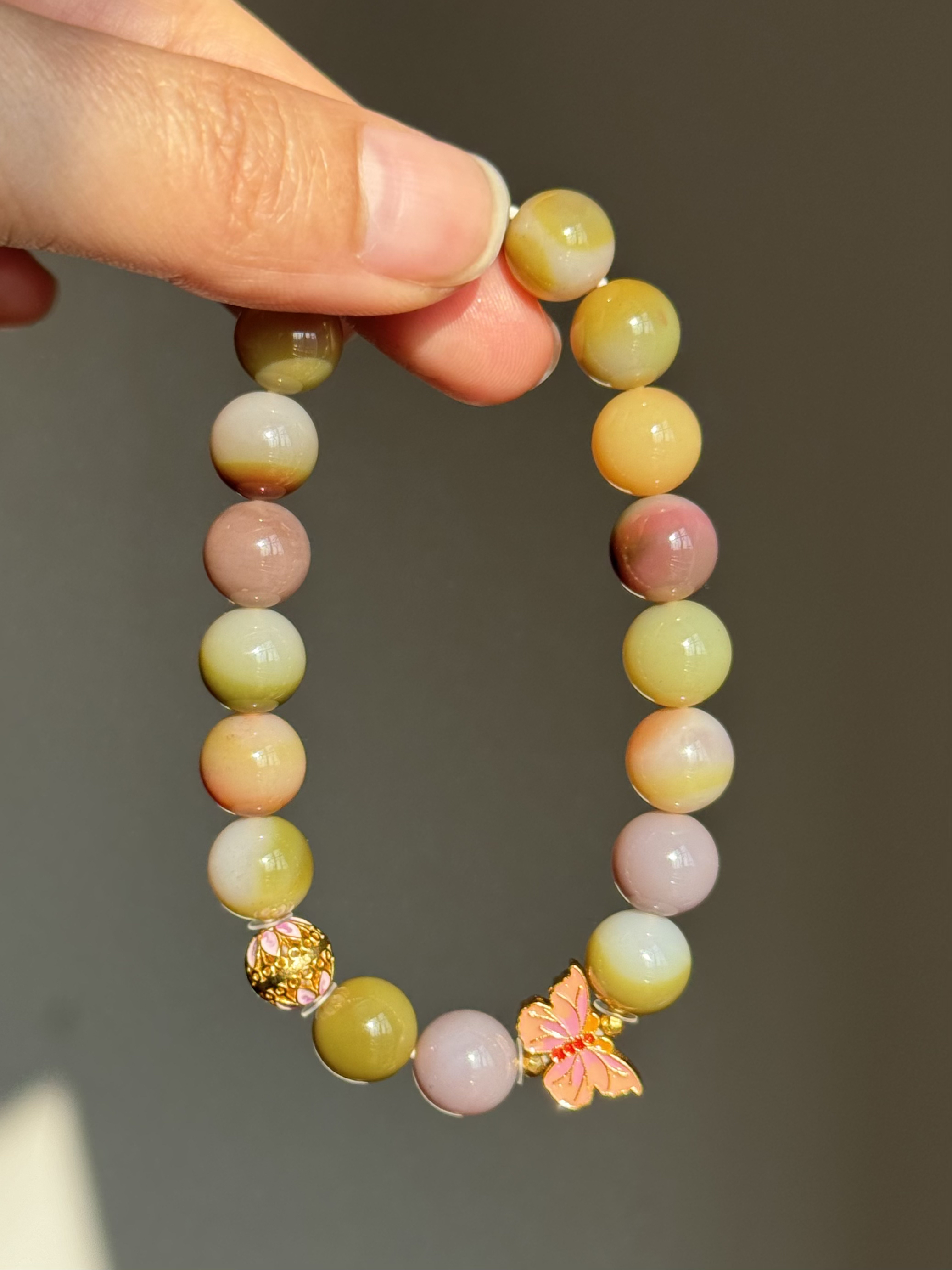 四川盐源玛瑙彩虹渐变银镶圆珠手串