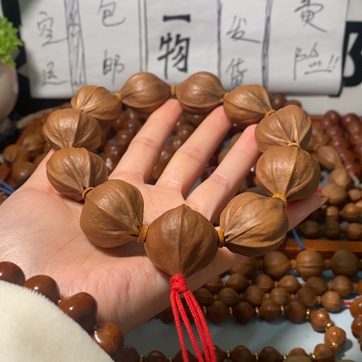 仇***格手串橄榄核1372精品4花老树王蒜头铁核10+1颗