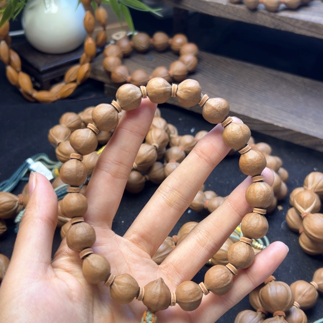 手串橄榄核13正圆光珠料子