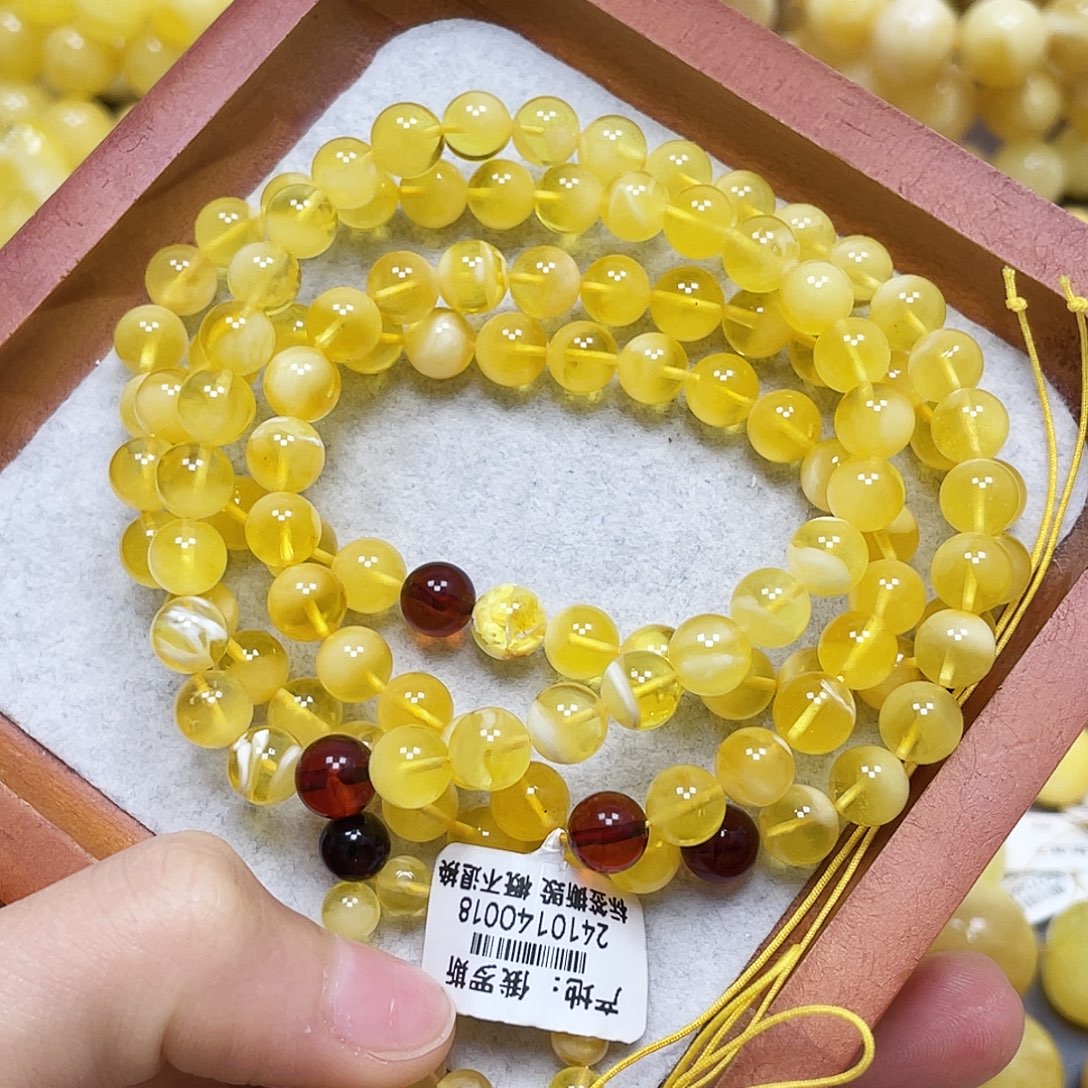 蜜蜡未镶嵌裸石7+mm.瑕