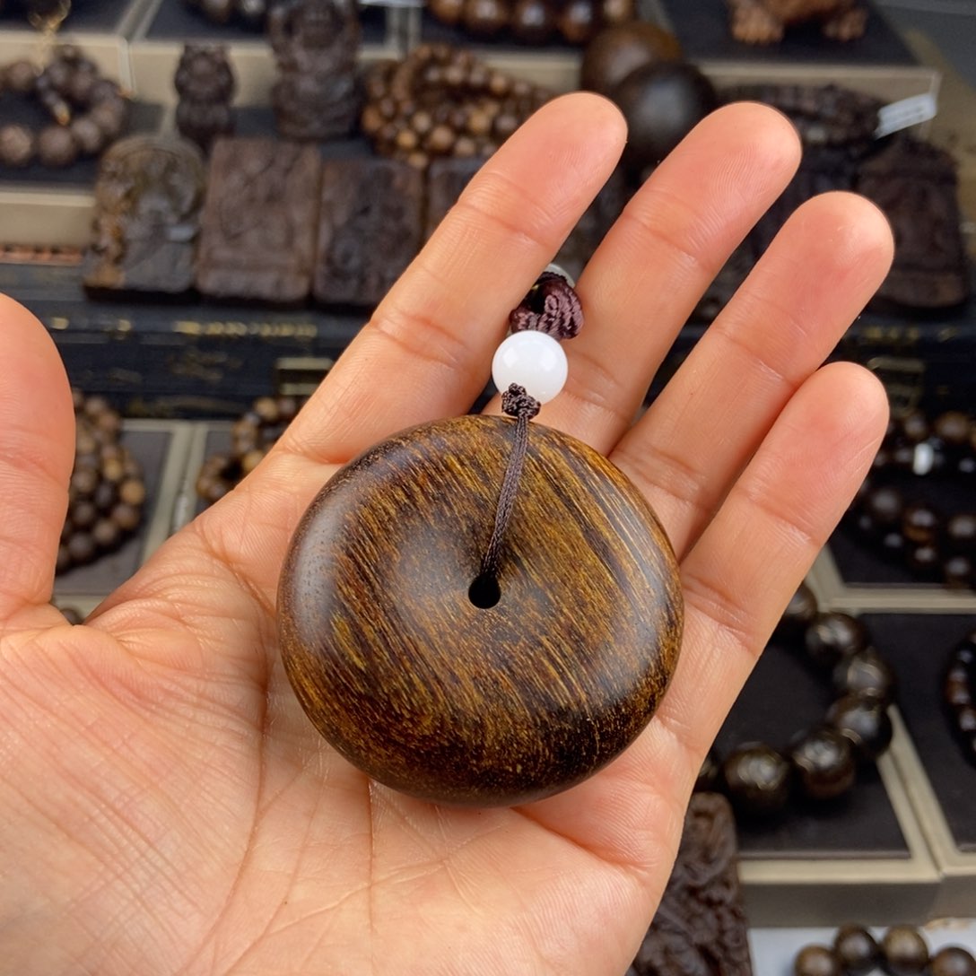 沉香木吊坠琴****店越南芽庄白棋老料