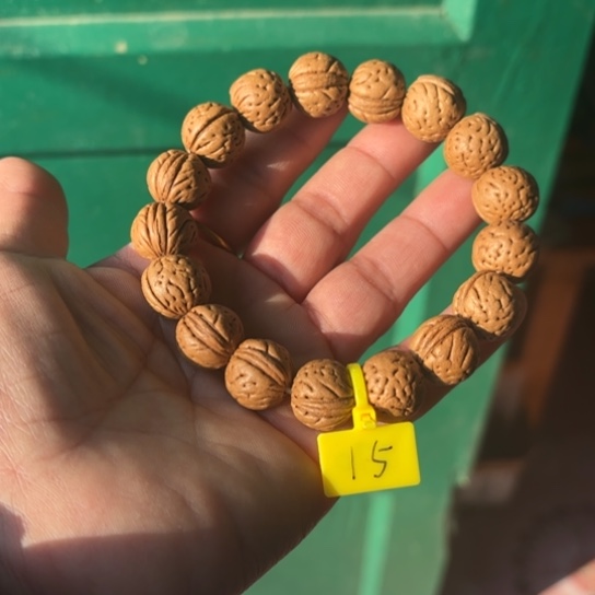 木质野生桃核手串