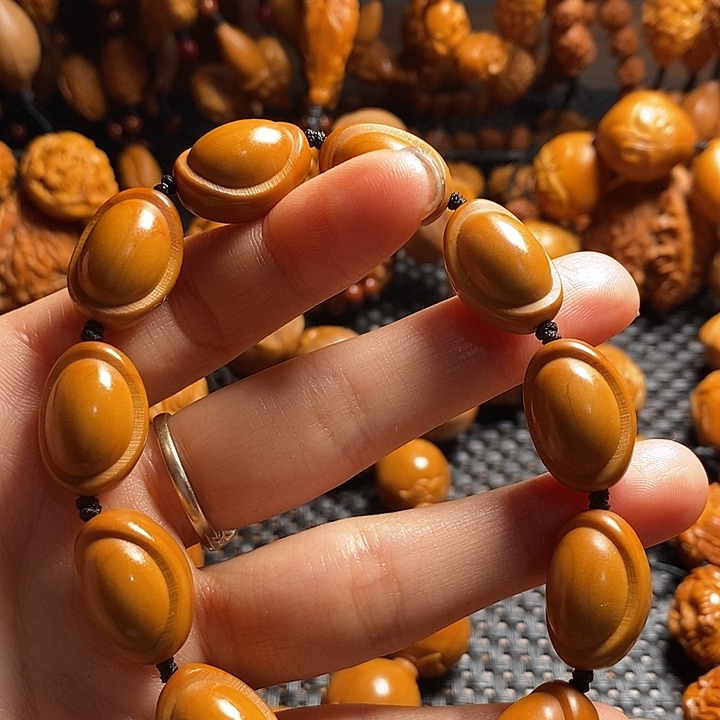 吊坠橄榄核阿*木金元宝