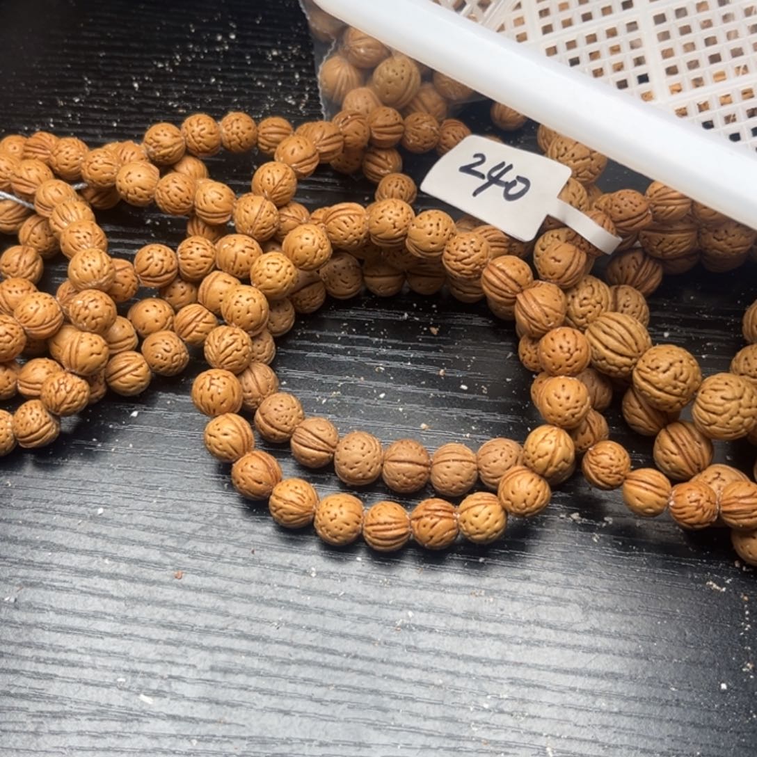 君***赞文玩核桃吊坠小桃核散籽批发