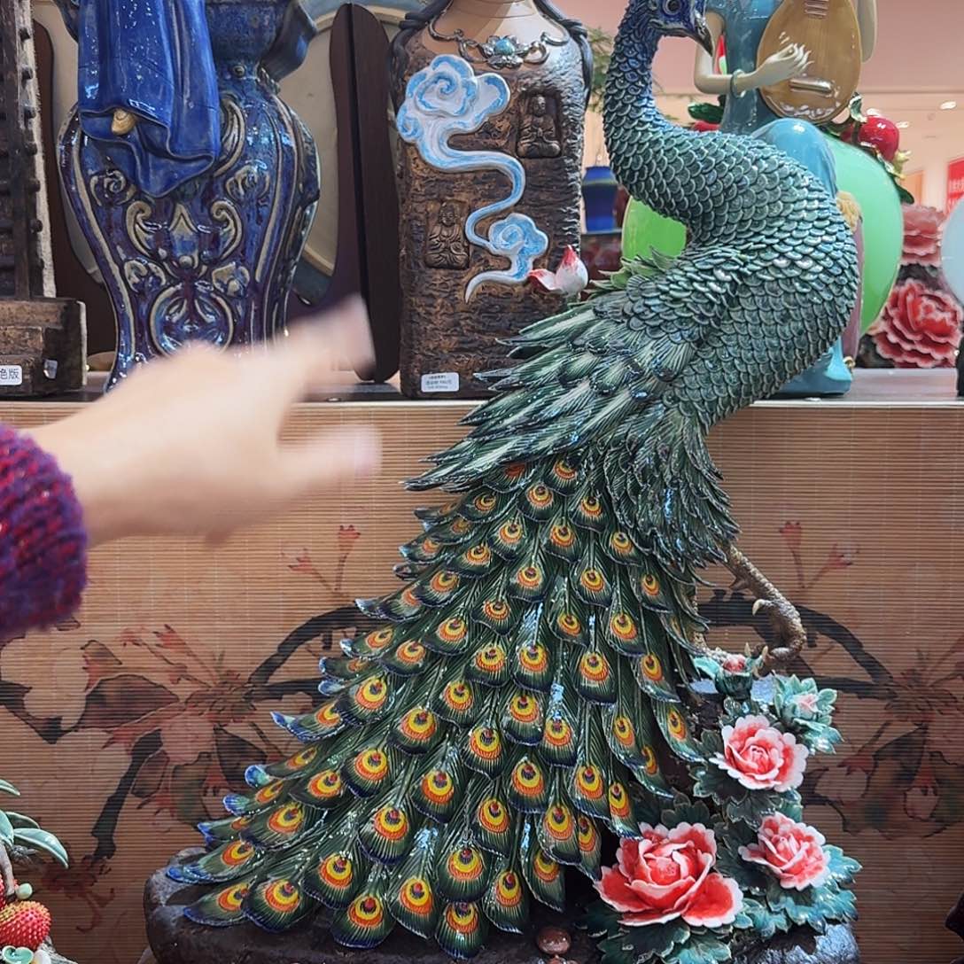 C***h陶瓷75高度孔雀精品