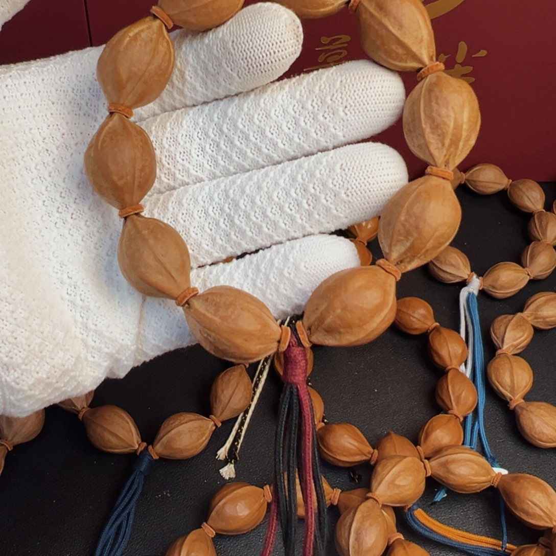 太***前吊坠橄榄核梅林铁核18-26