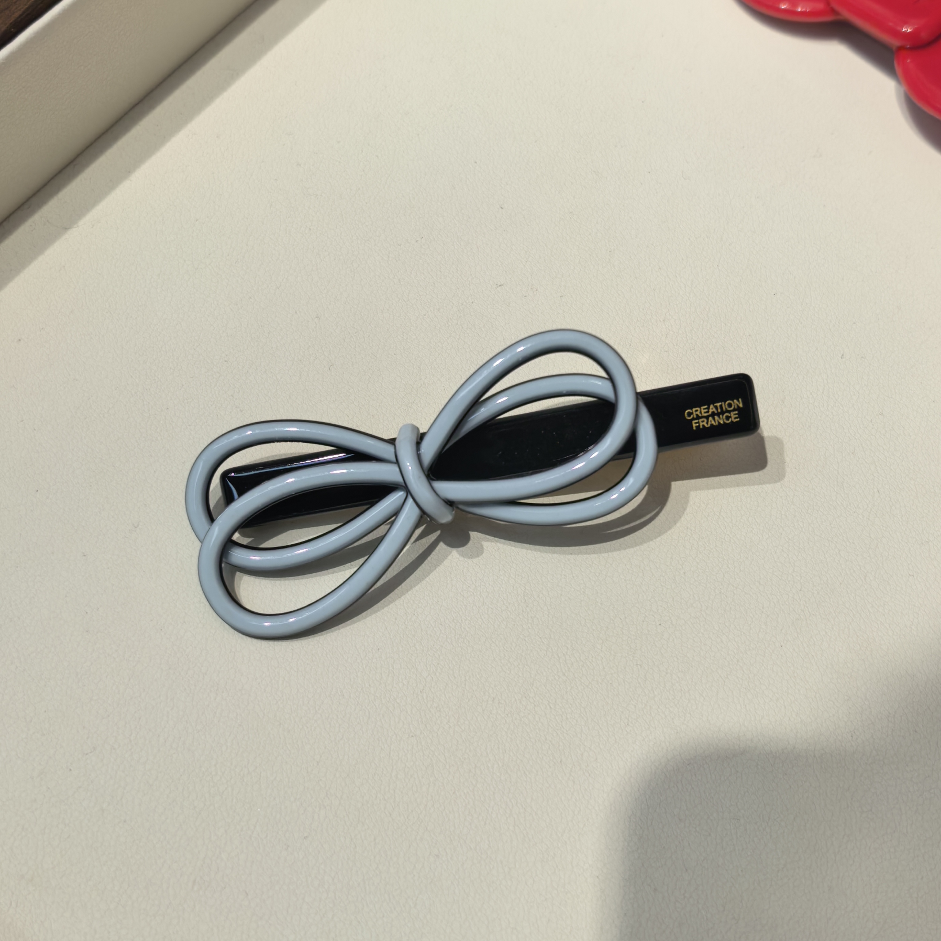 D574蓝色双蝴蝶结醋酸边夹