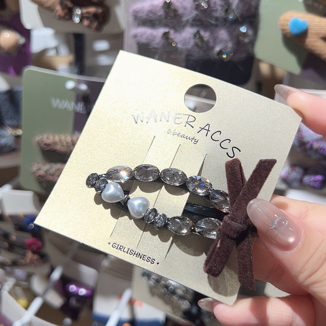 非金属咖色蝴蝶结珠珠钻鸭夹