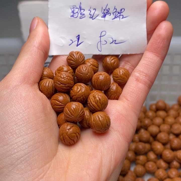 猪***郎手串桃核11mm左右野生红锦鲤22颗（打孔）