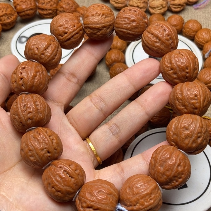 文玩核桃吊坠光头手串