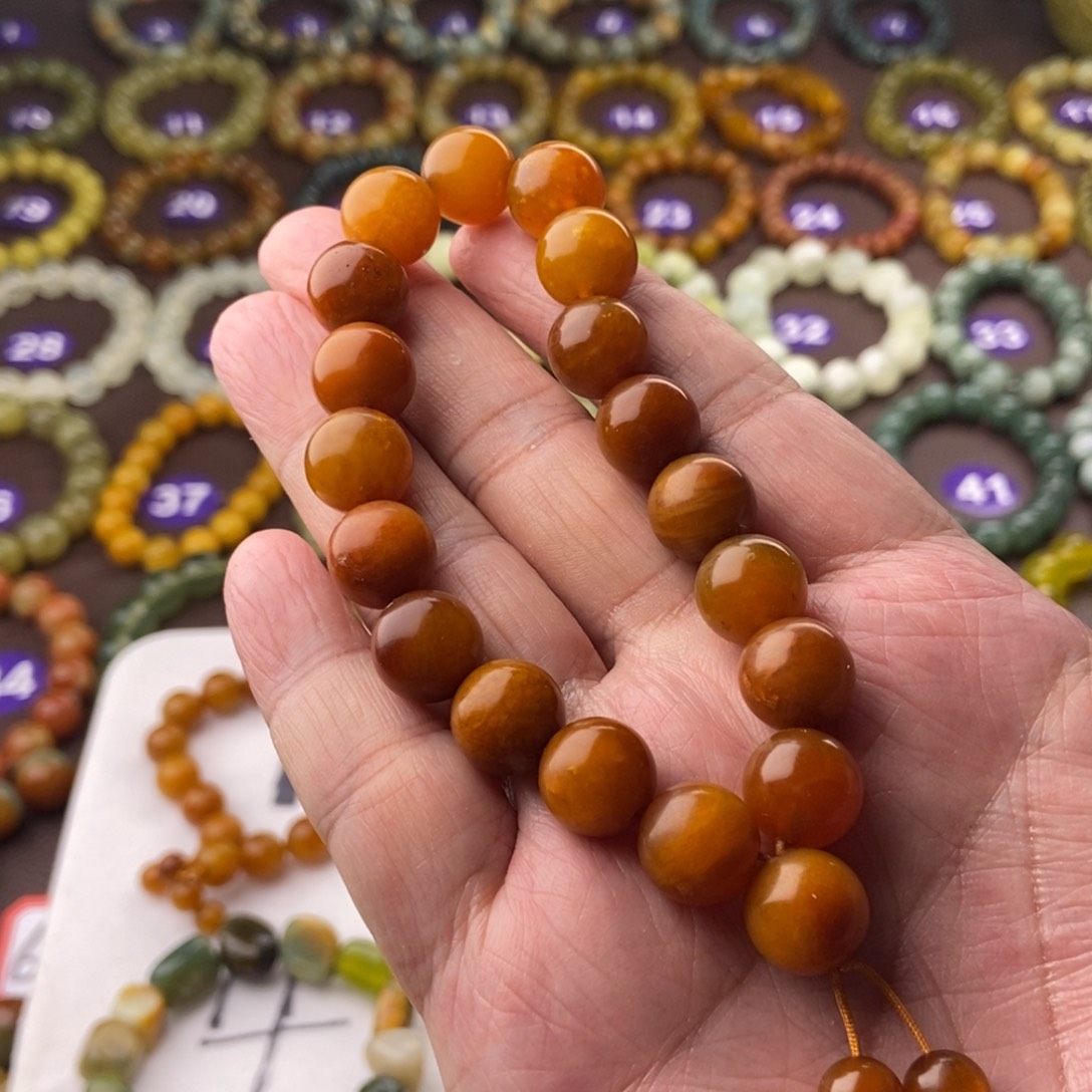 蛇纹石玉手串未镶嵌心***?