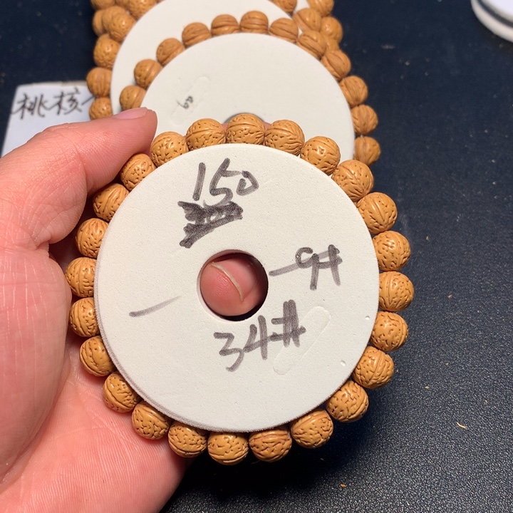 桃核手串34号健健康康了