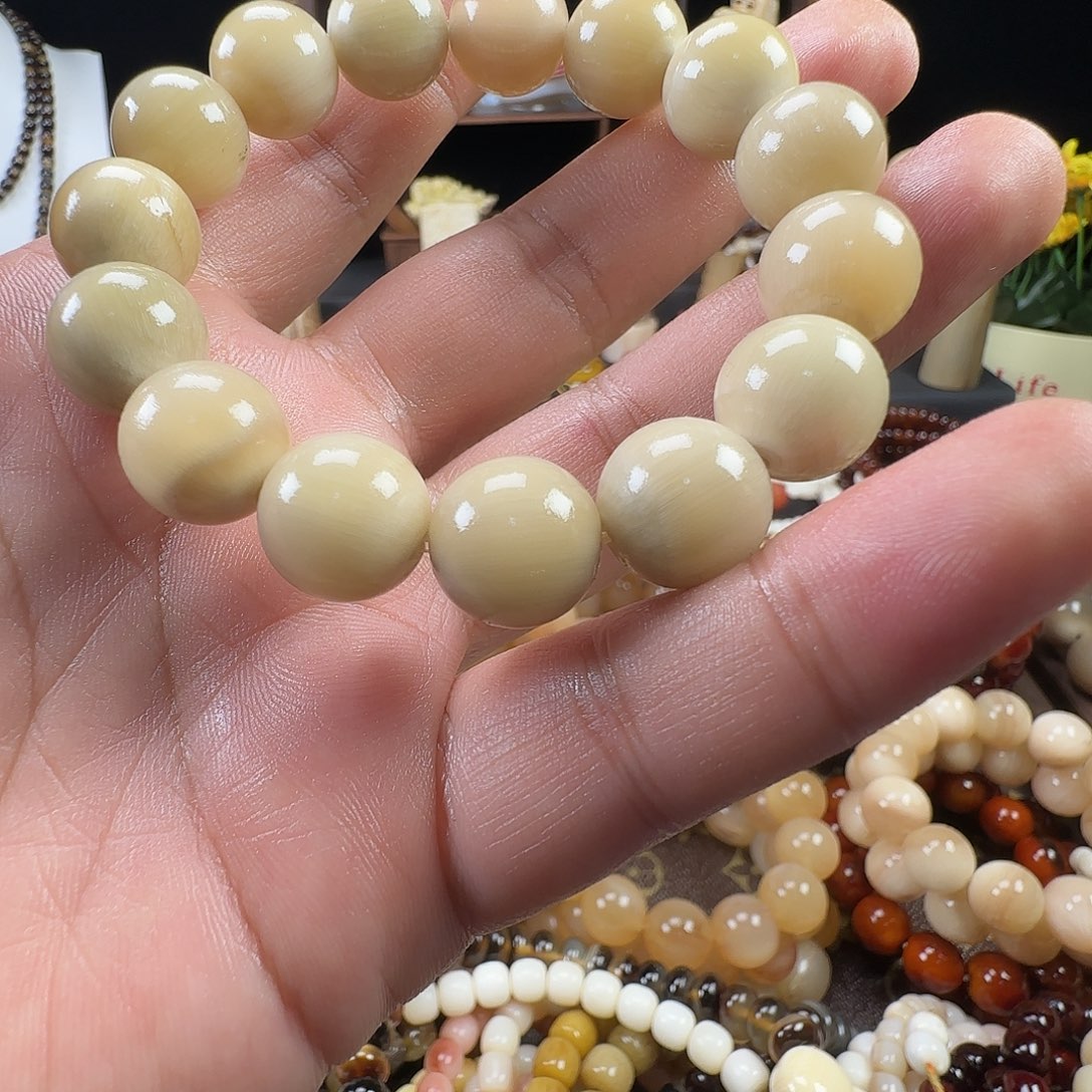 苹****皮质非金属高级牛角手串