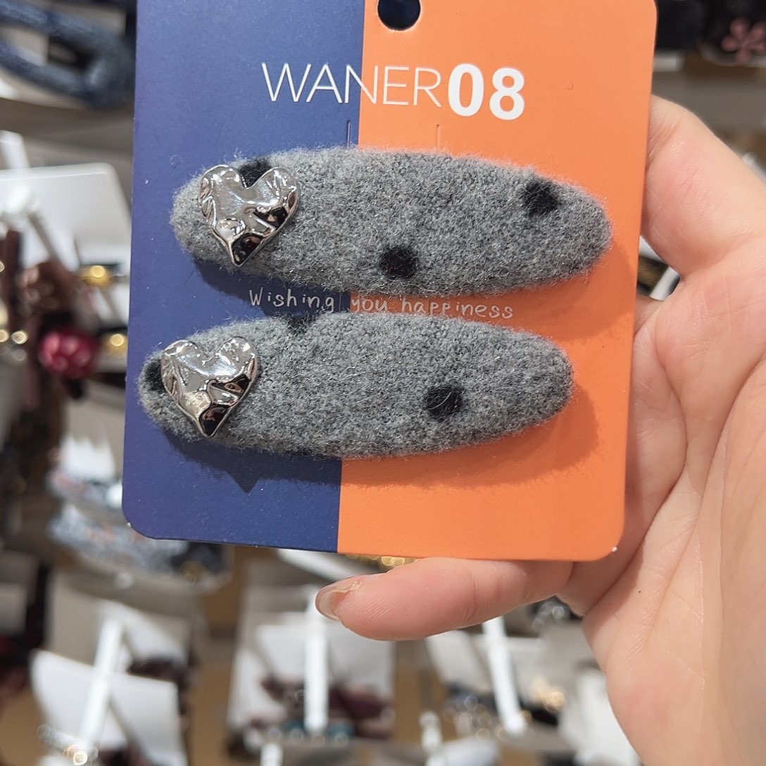 小***怪羽毛不锈钢爱心灰色掰掰夹