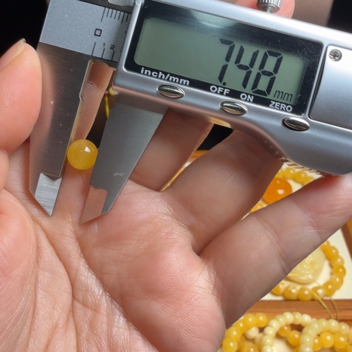 蜜蜡未镶嵌裸石蜜蜡单珠带花粉特价不退换