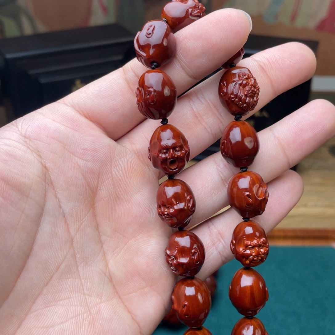 橄榄核手串雷*手持罗汉表弟回血