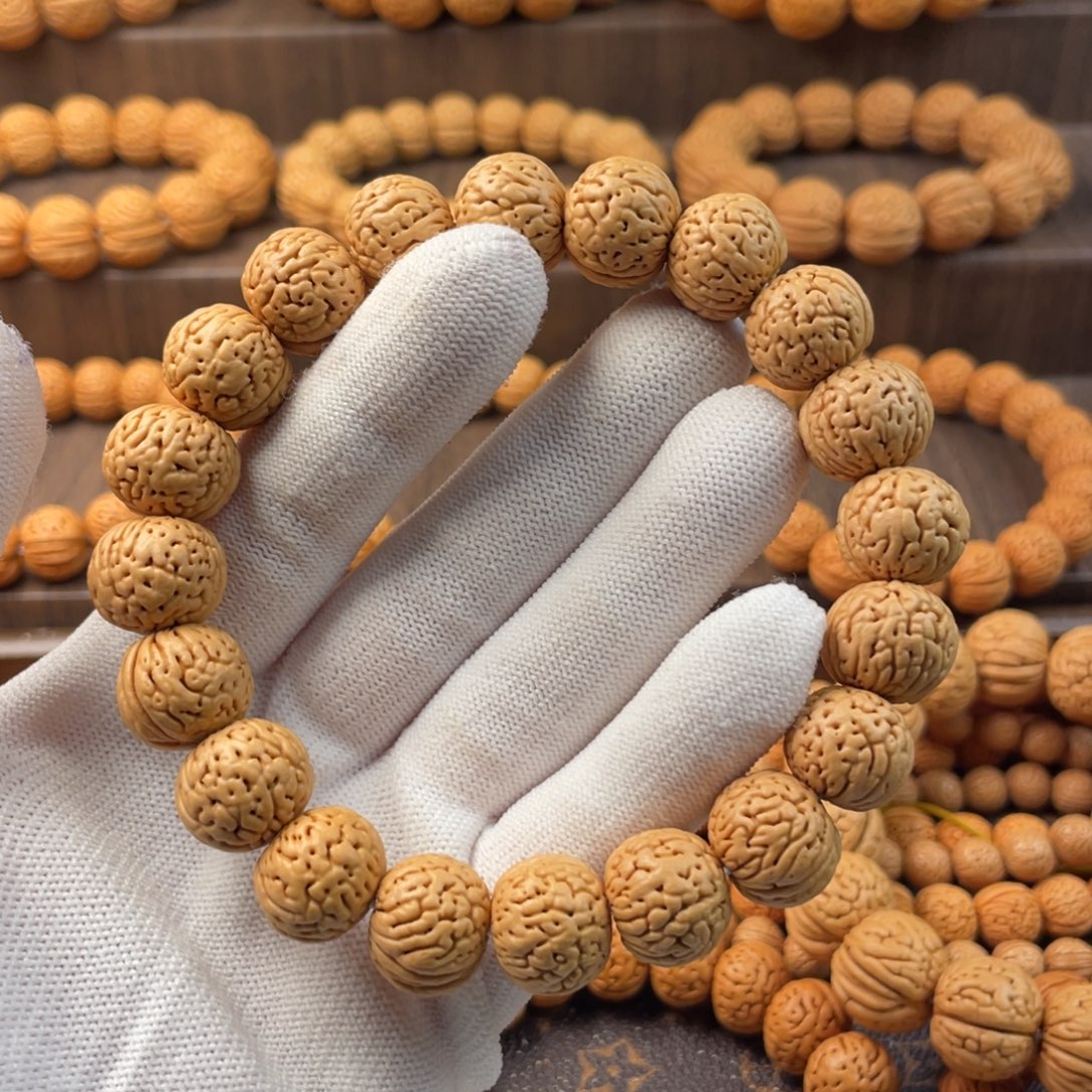 炼***鑫吊坠桃核肌肉苹果